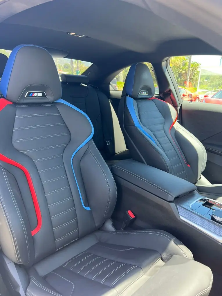 BMW M2 2024, rear view — Zurich Luxury Car Rental, Zurich. BMW M2 in Zurich The BMW M2 2024 is offered for rental in Zurich, a sport-bodied model…