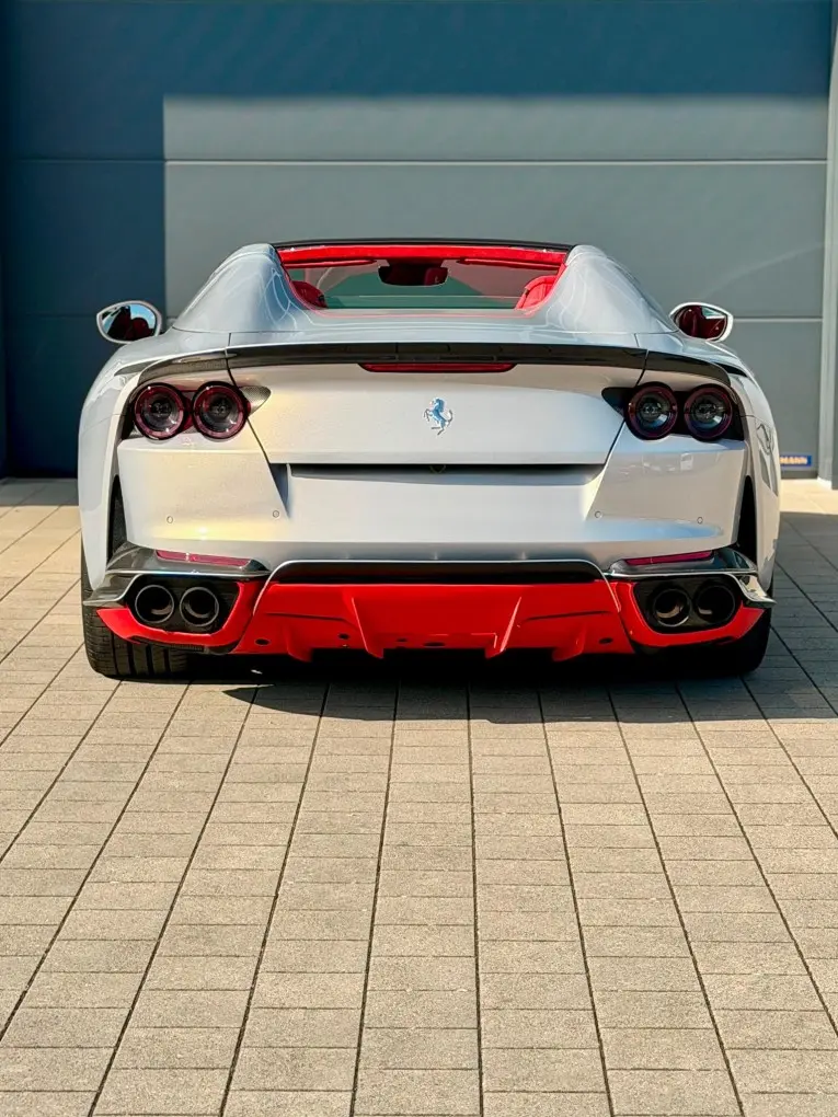 Ferrari 812 GTS 2024, rear view — Zurich Luxury Car Rental, Zurich. Ferrari 812 GTS in Zurich The Ferrari 812 GTS is available to rent in Zurich for guests…