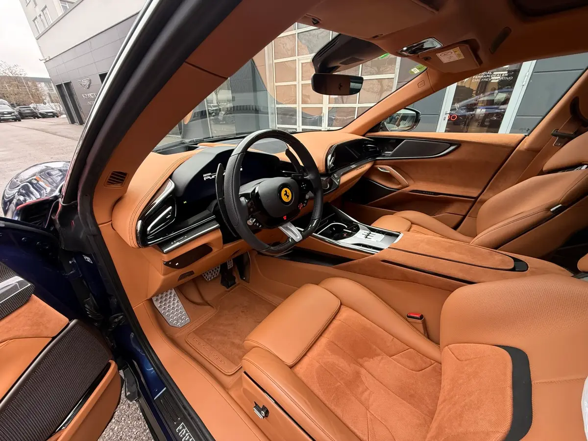 Ferrari Purosangue 2024, rear view — Zurich Luxury Car Rental, Zurich. Ferrari Purosangue in Zurich The Ferrari Purosangue is available to rent in Zurich as a…