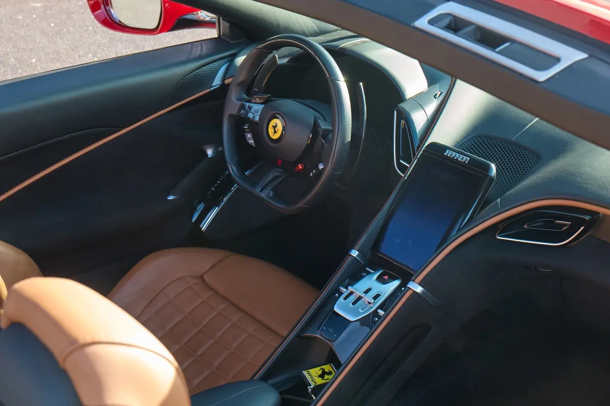 Ferrari Roma Spider 2024, rear view — Zurich Luxury Car Rental, Zurich. Ferrari Roma Spider in Zurich The Ferrari Roma Spider is available to rent in Zurich as a…