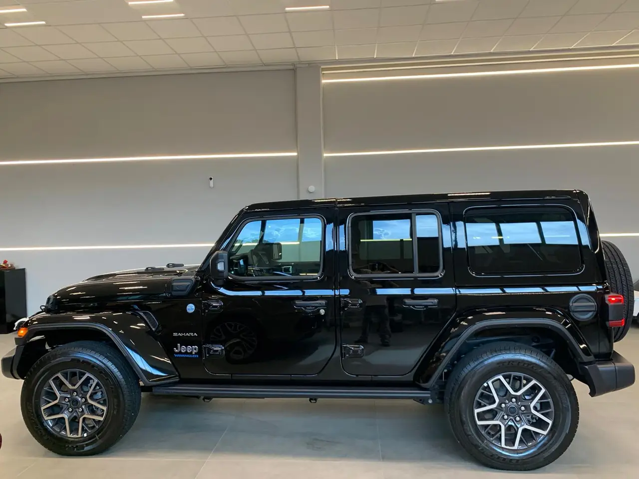 Jeep Wrangler 2025, side profile — Zurich Luxury Car Rental, Zurich. Jeep Wrangler in Zurich The Jeep Wrangler 2025 is available to rent in Zurich as a…