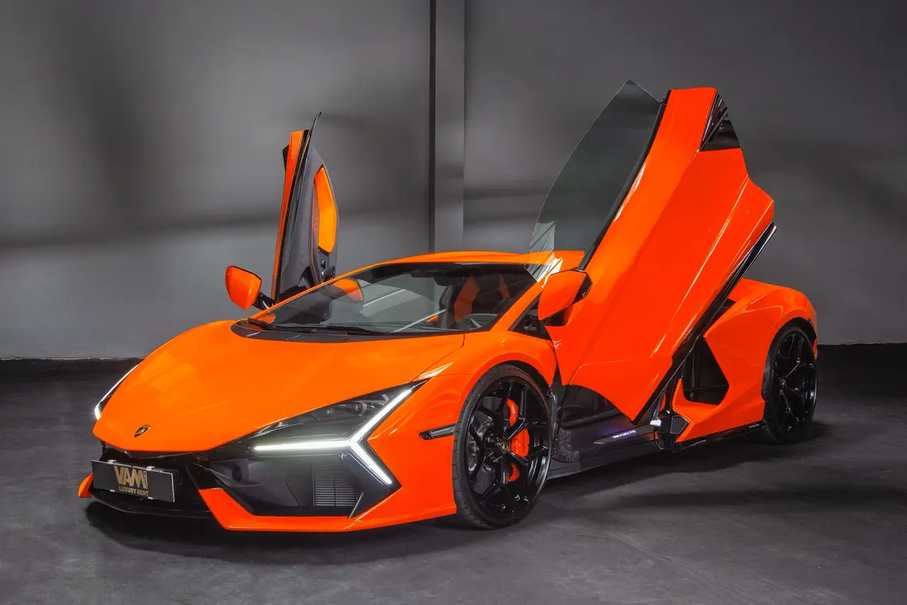 Lamborghini Revuelto 2026, side profile — Zurich Luxury Car Rental, Zurich. Lamborghini Revuelto in Zurich The Lamborghini Revuelto is available to rent in Zurich as…