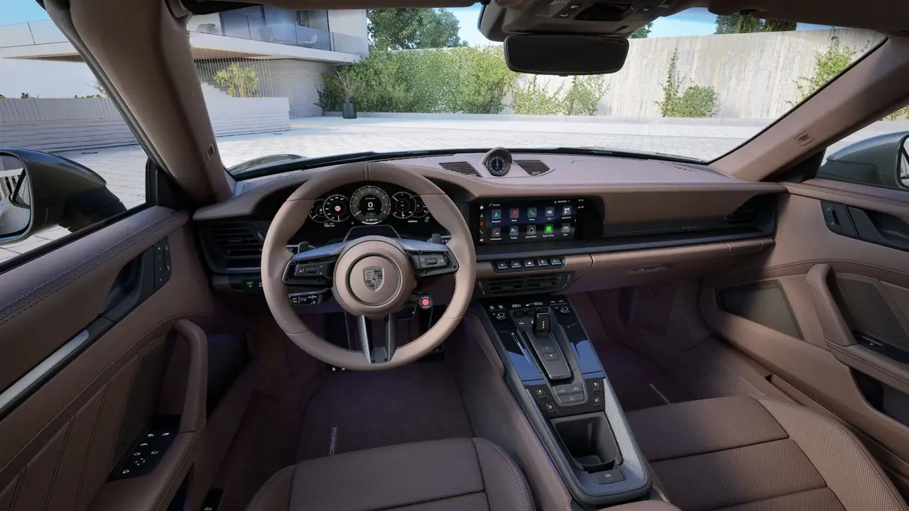 Porsche 911 992 Carrera Turbo S Cabrio 2026, rear view — Zurich Luxury Car Rental, Zurich. Porsche 911 992 Carrera Turbo S Cabrio in Zurich The Porsche 911 992 Carrera Turbo S…