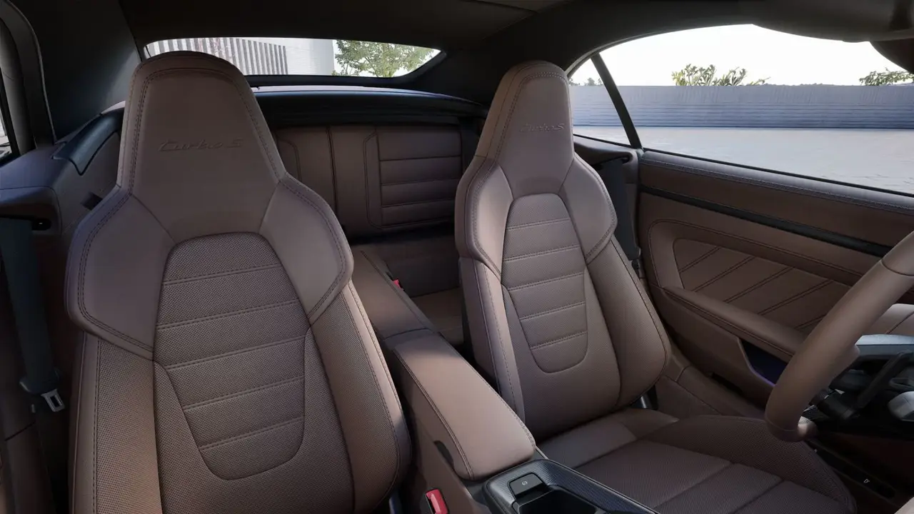 Porsche 911 992 Carrera Turbo S Cabrio 2026, interior — Zurich Luxury Car Rental, Zurich. Porsche 911 992 Carrera Turbo S Cabrio in Zurich The Porsche 911 992 Carrera Turbo S…