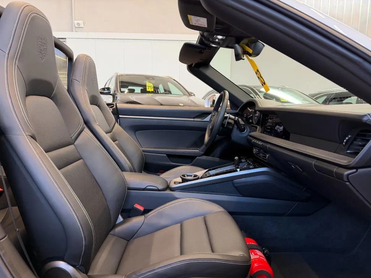 Porsche 911 Carrera S Cabrio (992) 2025, exterior — Zurich Luxury Car Rental, Zurich. Porsche 911 Carrera S Cabrio (992) in Zurich The Porsche 911 Carrera S Cabrio (992) is…
