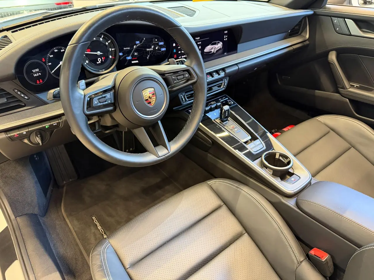 Porsche 911 Carrera S Cabrio (992) 2025, front view — Zurich Luxury Car Rental, Zurich. Porsche 911 Carrera S Cabrio (992) in Zurich The Porsche 911 Carrera S Cabrio (992) is…
