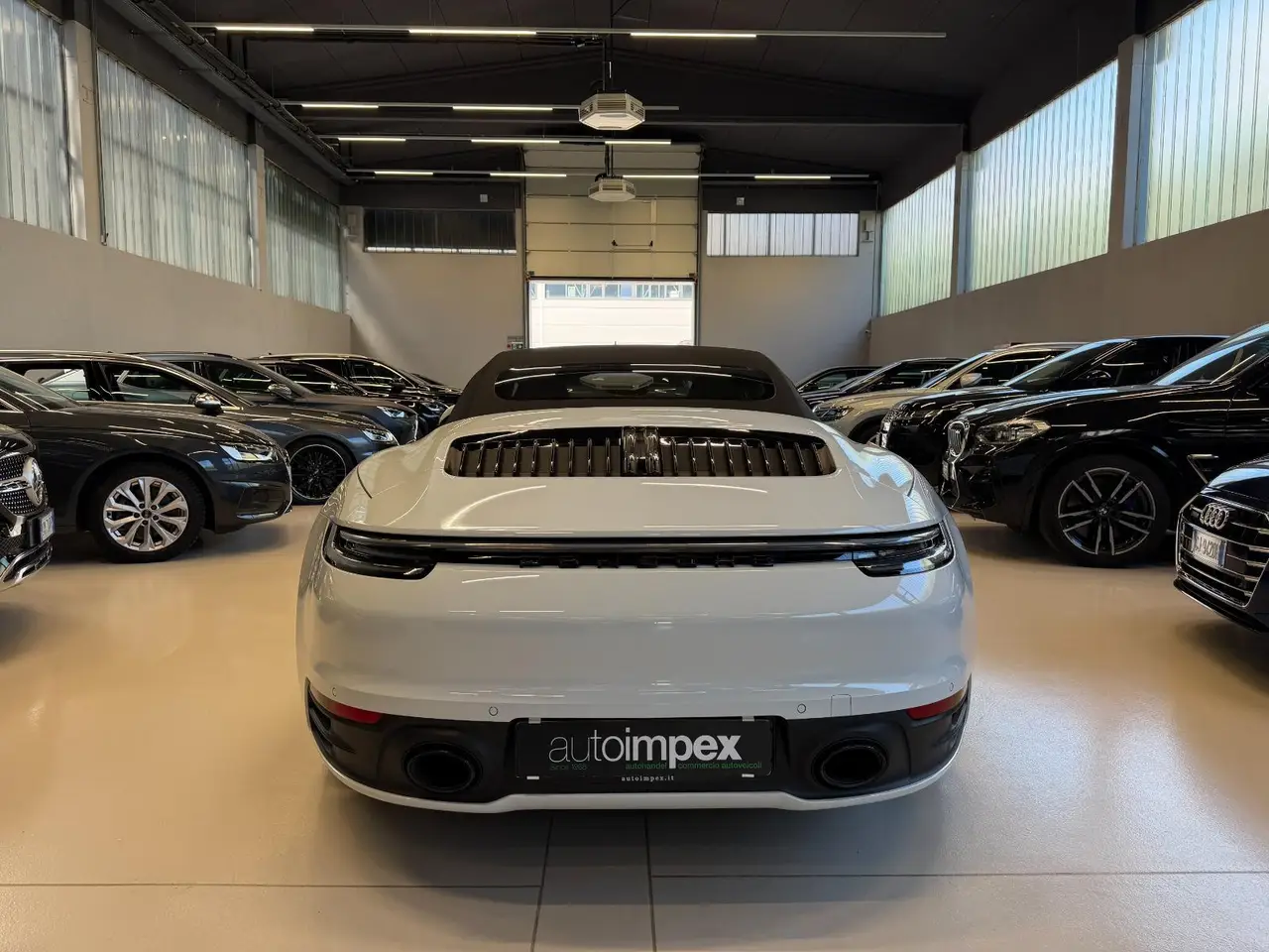 Porsche 911 Carrera S Cabrio (992) 2025, exterior — Zurich Luxury Car Rental, Zurich. Porsche 911 Carrera S Cabrio (992) in Zurich The Porsche 911 Carrera S Cabrio (992) is…