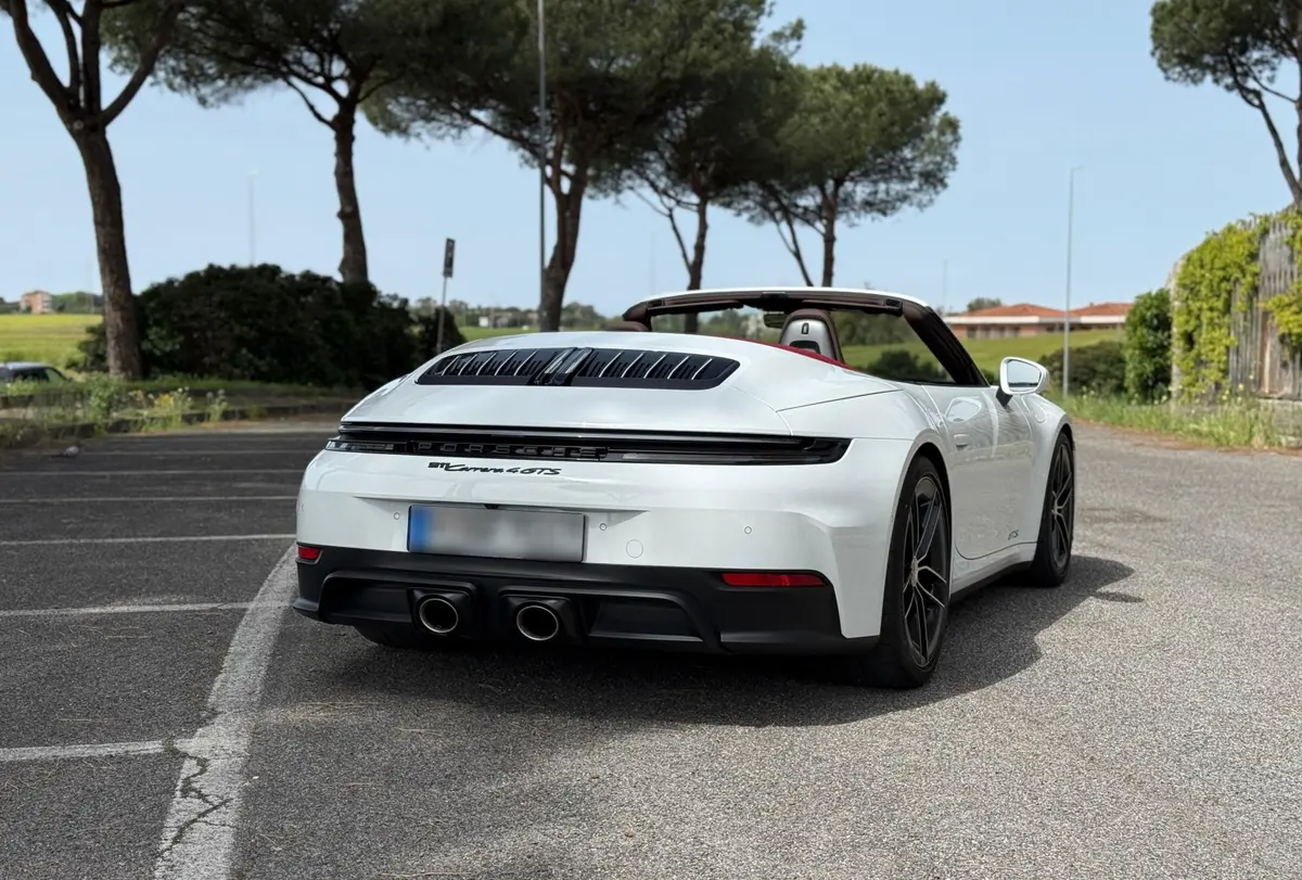 Porsche 992.2 Carrera 4 GTS Cabrio 2025, rear view — Zurich Luxury Car Rental, Zurich. Porsche 992.2 Carrera 4 GTS Cabrio in Zurich The Porsche 992.2 Carrera 4 GTS Cabrio is…