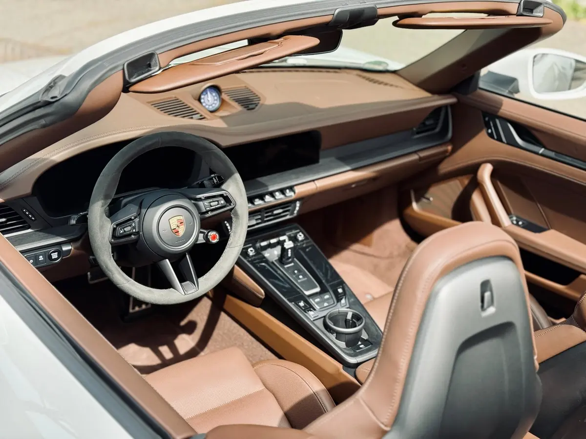 Porsche 992.2 Carrera 4 GTS Cabrio 2025, interior — Zurich Luxury Car Rental, Zurich. Porsche 992.2 Carrera 4 GTS Cabrio in Zurich The Porsche 992.2 Carrera 4 GTS Cabrio is…